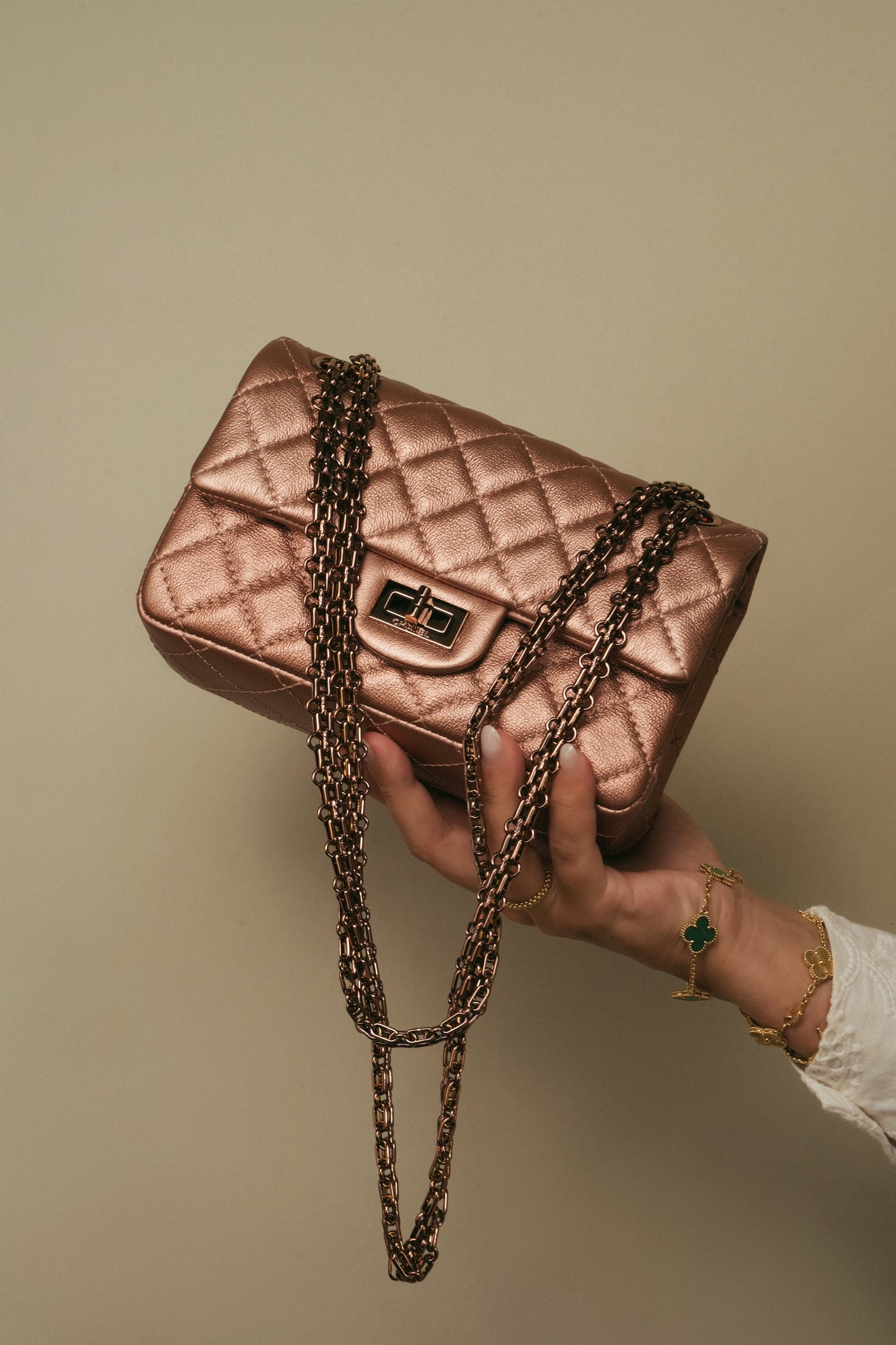 21A Rose Gold Grained Calfskin Quilted Mini Reissue 2.55 Flap Bag